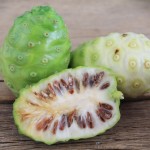 Morinda citrifolia or noni on wooden